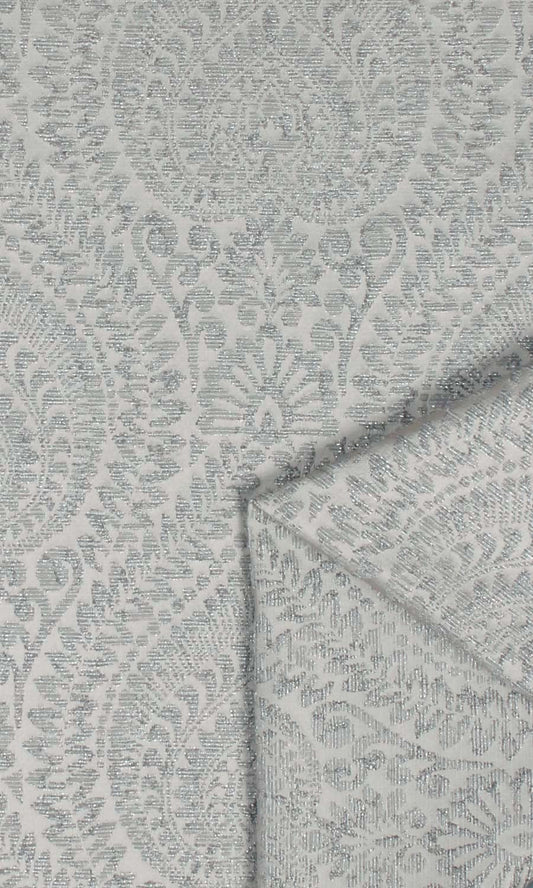Grey damask patterned drapery