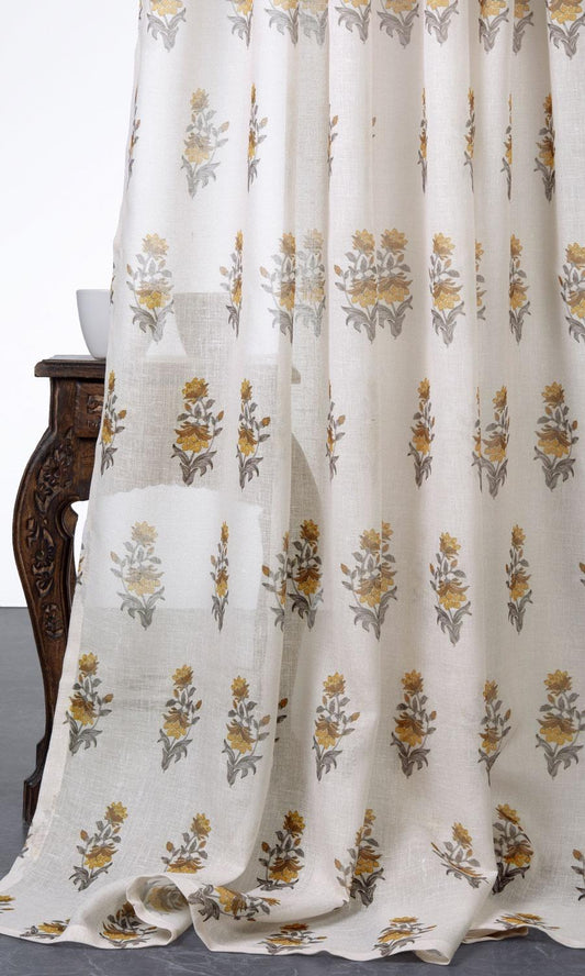Yellow floral patterned sheer drapery panels